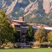 An image of Wardenburg Health with the Flatirons in the background. (Photo by  Patrick Campbell/University of Colorado)