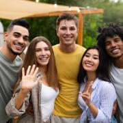 Group of young people posing for a photo