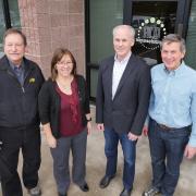 Professor Alan Weimer, CU Boulder alum Karen Buechler, CU Boulder alum Mike Masterson and Professor Steve George at ALD NanoSolutions in Broomfield, Colorado.