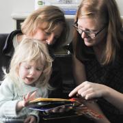 Graduate student Abby Stangl works with blind preschoolers at the Anchor Center for the Blind