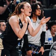 Colorado women's basketball player Frida Formann cheers on her team