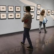 Attendees check out climate change exhibit at CU Art Museum