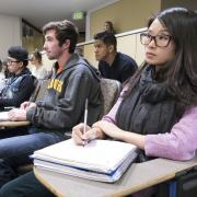 Students listen to lecture in classroom