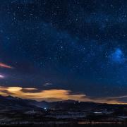 Starry night over mountainscape