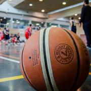 Basketball sitting on court