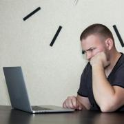 A man using a laptop computer