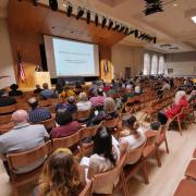 Audience members listen to a presenter during the 2023 BFA awards