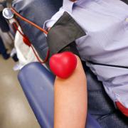 A person donating blood during a CU Boulder blood drive