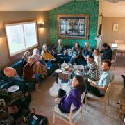 Graduate students gather at David Ciplet's home to share podcasts