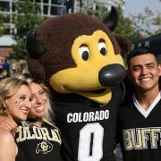 Buffs cheerleaders pose for a photo with Chip the buffalo mascot