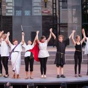 Teenage actors during curtain call at Mary Rippon Outdoor Theatre