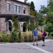 Students stand in front of C4C building