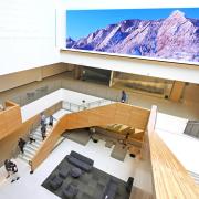 Campus community members walking down the stairs in the CASE building