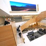 Campus community members walking up a staircase in the CASE building