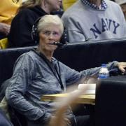 Carol Callan, left, doing commentary at a Colorado women's basketball game