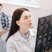 Doctor examines MRI