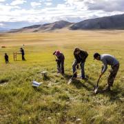 Archaeologists investigate an ancient habitation site in western Mongolia