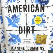 Copies of ‘American Dirt’ sit on a rack at a bookstore in New York