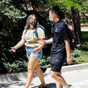 Students in masks on campus