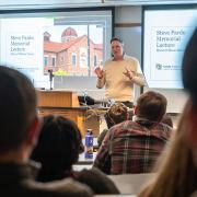 Leeds professor Shaun Davies speaking to students