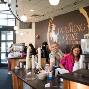 Students working in Laughing Goat coffee shop inside Norlin Library
