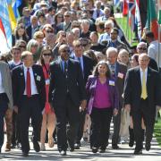 67th annual CWA procession through international flags