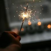 Someone holding a small sparkler