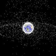 A computer-generated image representing space debris as could be seen from high Earth orbit.  (Image provided by NASA)