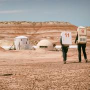 Researchers in front of the Mars Desert Research Station