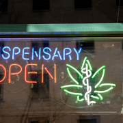 an open sign on a dispensary