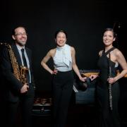 Paul Zaborac with a saxophone, Cecilia Lo-Chien Kao at piano, and Colleen White with a flute