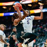 CU guard Jaylyn Sherrod attempts a shot against LSU.