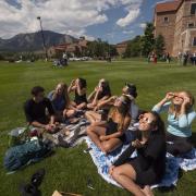 Students gather on the lawn to watch the 2017 solar eclipse