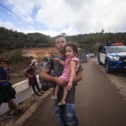Migrants hoping to reach the distant U.S. border walk along a highway in Guatemala