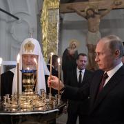 Patriarch of Russia Kirill and President Vladimir Putin at a monastery