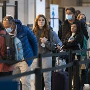 people in line at airport