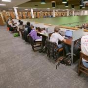 Students studying in Norlin Library