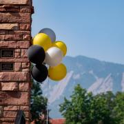 Black, gold and silver balloons