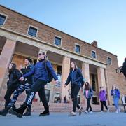 Students make their way past Norlin Library on the first day of classes for spring 2020 at CU Boulder. (Photo by Casey A. Cass/University of Colorado)