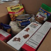 Inside a box of donated non-perishable foods