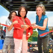 Cutting the ribbon at the formal dedication ceremony of Geometry Point