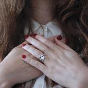 Woman crossing her hands over her chest