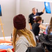 Students at a guided painting event on campus