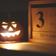 Jack-o-lantern and calendar marked Oct. 31