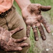 Man with dirty hands