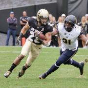 Running back Phillip Lindsay on the field