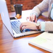 Person working on a laptop from home