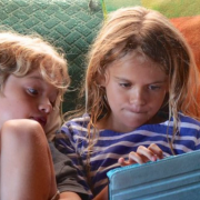 Two children with an ipad.