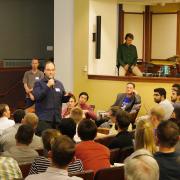 CU Boulder Entrepreneur in Residence Nigel Sharp addresses the audience at a New Venture Challenge event.