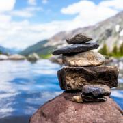 stacked rocks on river